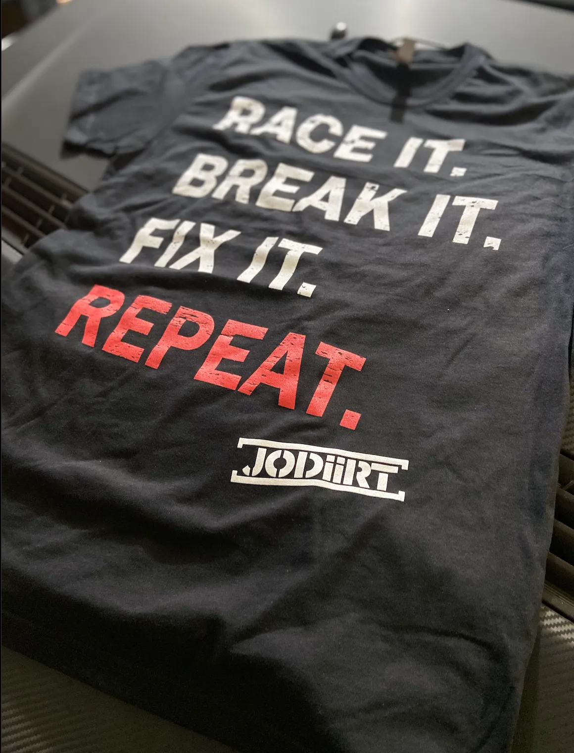 On Repeat Race Unisex Tee